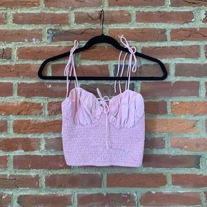 Pink smocked bustier top